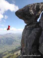 BASE jumper exit from a cliff